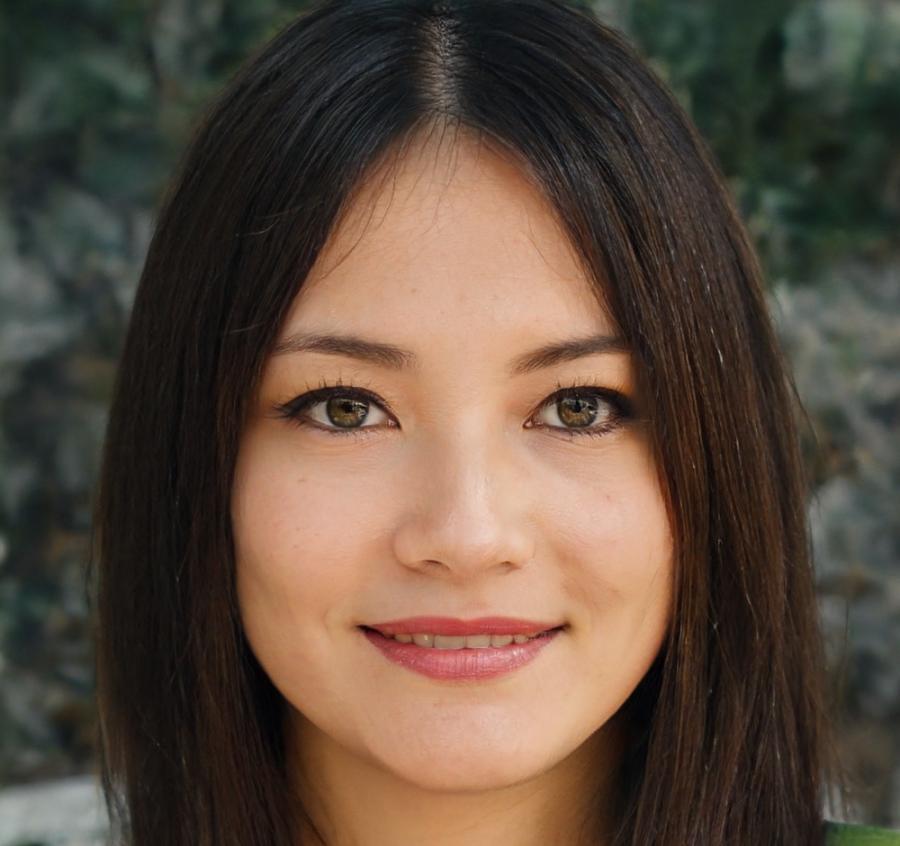 Portrait de Kadiatou Traoré, organisatrice d'événements satisfaite